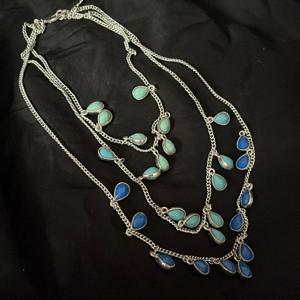 Three shades of blue in silver